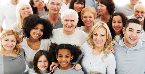 A large group of people smiling